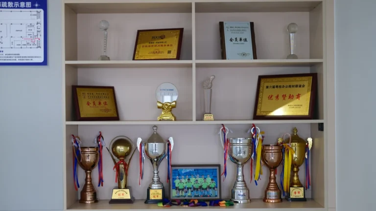 company honor wall displaying certificates and achievements.